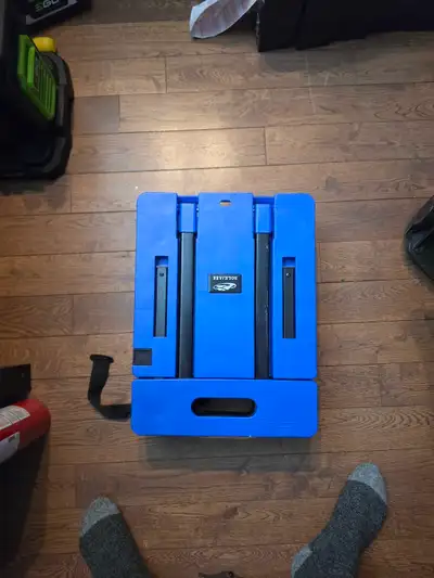 I am selling a blue Ronlap folding hand truck, also known as a foldable dolly, capable of handling u...