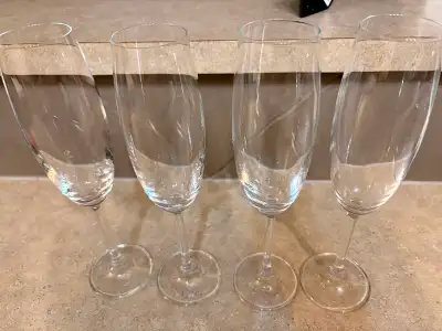 4 Clear glass champagne flutes, View more