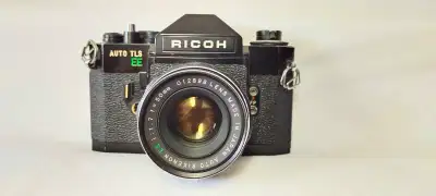 Vintage film camera and lens, View more
