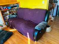 Comfy recliner.  Needs upholstering, new hardware