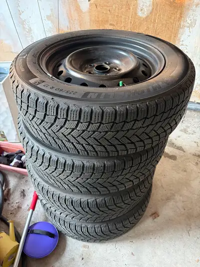 Selling a complete set of 4 Michelin X-Ice Snow winter tires mounted on steel rims. Details: * Miche...
