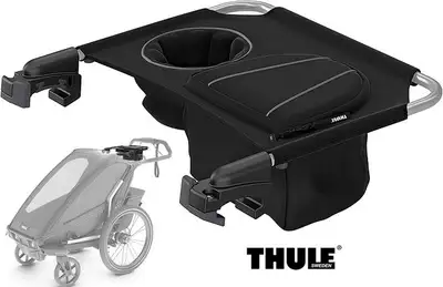 Handlebar organizer with a zippered pocket and a built-in cup holder. Compatible with both Thule Cha...
