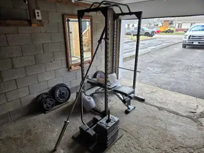 Full power rack with bench, iron plates (600lbs), Olympic bar.