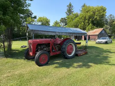 Massey Ferguson tractor with 4 attachments , View more