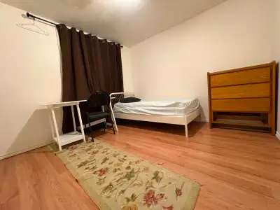 A bedroom on the lower level of a duplex house is available on July 1. A University student and a wo...
