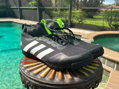 A new pair of Adidas “The Gravel” Cycling Shoes without a box. The official color pattern is Core Bl...