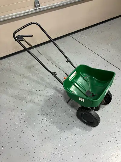 Scott’s fertilizer spreader mini, in like new condition used once cleaned then Sat in shed since the...