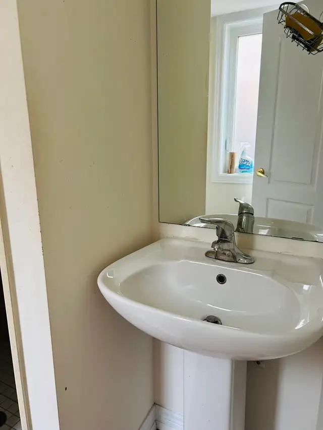 Furnished room with attached washroom and separate entrance