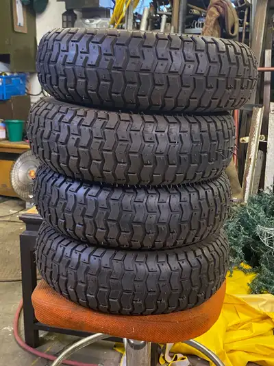 Brand new princess auto tires on greaseable wheels. Off road only. Paid 80$ per + tax. Selling for 2...