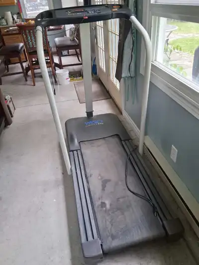 Folding treadmill., View more
