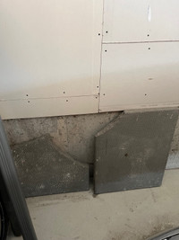 **Free** two chipped pieces of concrete sidewalk stones.