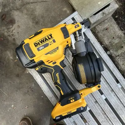 DEWALT 20V MAX XR Lithium-Ion Cordless Brushless 15-Degree Roofing Nailer. Basically brand new, used...