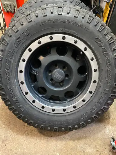 Set of 4 Good year wrangler duratrac’s 265/70/R17 mounted on HD series KMC rims Tires are 11/32nds b...