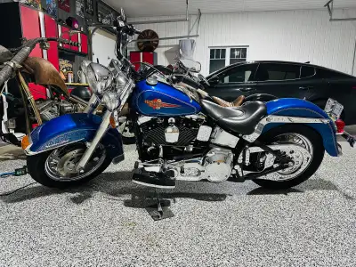 For sale is a super clean 1993 « Evo » Heritage softail. This rolling piece of history with only 60,...