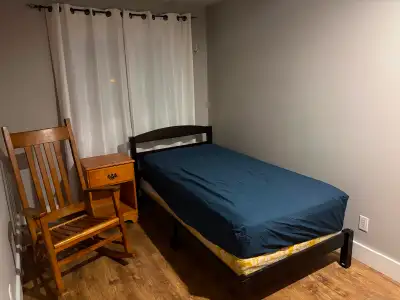 Furnished room available for a professional working person in a quiet home. Utilities wifi laundry u...