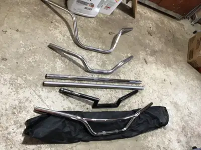 HARLEY-DAVIDSON HANDLEBARS,$100, 416—254-4988. DRAG BARS. - 1 STAINLESS 1 CHROME, Z-BARS, ASSORTED 1...