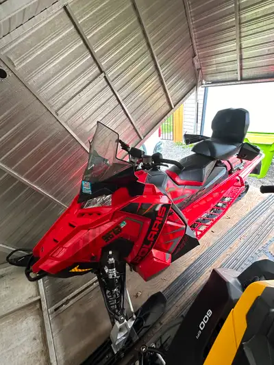 137” track. 2 up seat with heated hand grips. Windshield is broken. Asking $7000. Approx 4600 miles