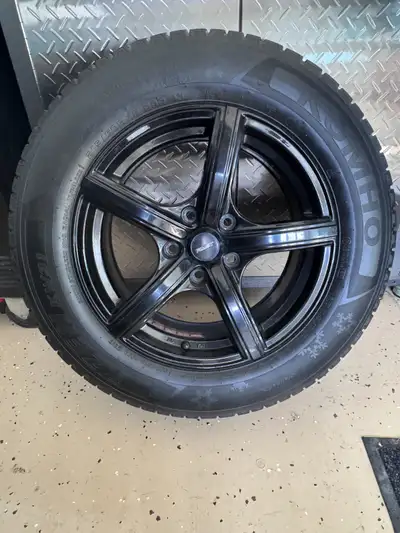 I am selling a set of Kumho I'ZEN KW31 winter tires mounted on 16" black alloy rims the tires are si...