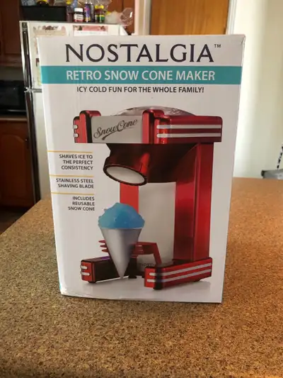 Make snow cones a fun, nostalgic experience with this Nostalgia Retro snow cone maker! It has been g...