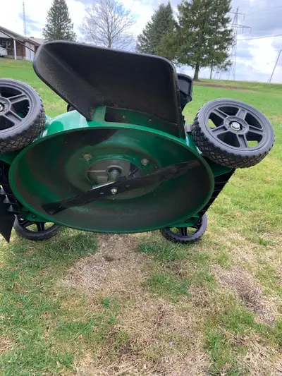 practically New lawn mower, View more