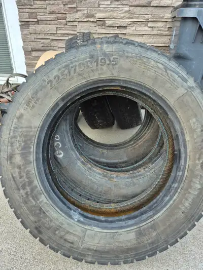Set of 5 blackhawk 225/70R19.5 tires. Around 11 to 12 mm of tread left. Tires all hold air. The tire...