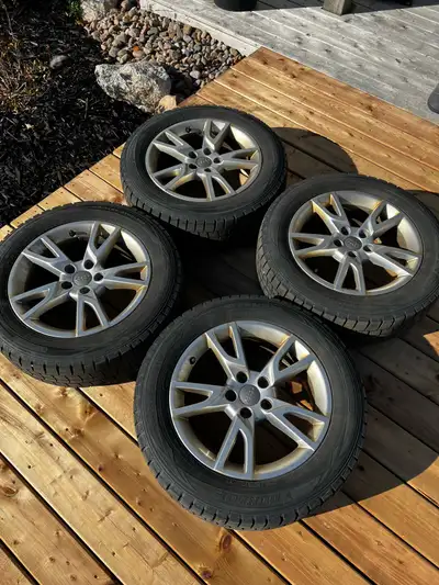 Alloy rims from 2016 Audi Q3. Winter tires used 3 seasons and have one left. Rims are in great shape...