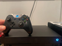 1Tb XBox One X with controller and games