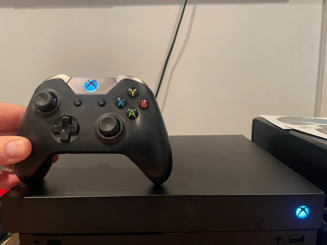 1Tb XBox One X with controller and games in XBOX One in Winnipeg