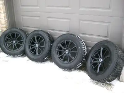 I am selling a set of 4 LIKE NEW RTX Contour Black Alloy Rims complete with a set of 85% Tread Bridg...