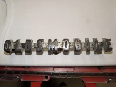 Original 1956 Oldsmobile front grill emblem
