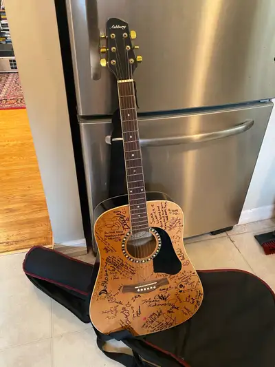 Ashbury acoustic Guitar, with soft case. $140 Burlington
