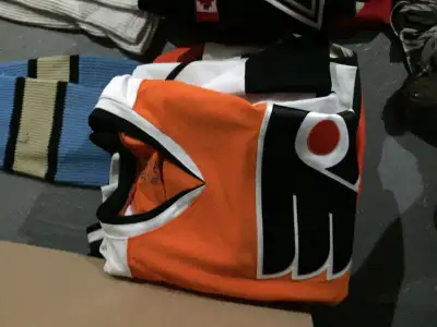 An assortment of hockey jerseys & practice jerseys - sizes range from XS-L -$15 & up each An assortm...