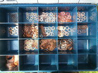 Assortment copper washers in steel case