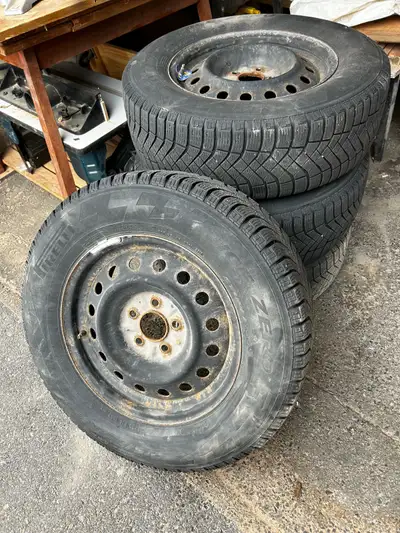 Like new (4) Pirelli winter tires, rims included. Off a 2015 Kia Sportage. These tires have been use...