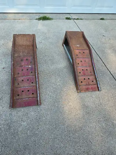 These heavy-duty metal car ramps are perfect for any home mechanic looking to get under their vehicl...