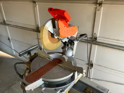 12” Ridgid compound sliding mitre saw with rolling stand, brand new trigger handle. Asking $375.