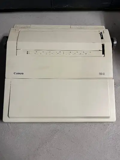 Vintage canon es 5 typewriter and cassette, View more