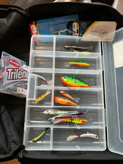 Handful of ice fishing gear for sale. No longer into the sport. Lightly used tackle, rods and reel....