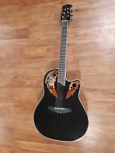 Ovation CC44 semi electric Guitar in good working condition Buy & Sell Kings Oshawa. We are located...
