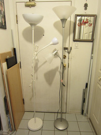 For sale two floor lights, six feet tall with adjustable head