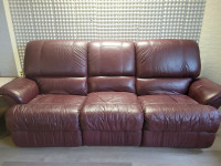 Burgundy leather couch and matching recliner