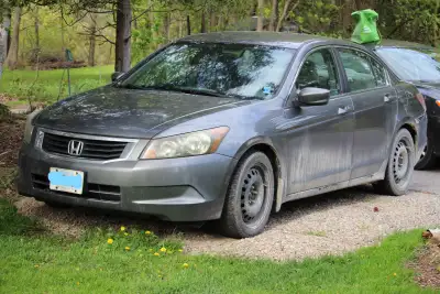 running Honda Accord parked at my brothers. Used until 4 weeks ago. Muffler disconnect near front (f...