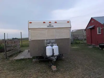 looks good but, no water , no furnace. Clean.. Rejigged with a permanent queen size bed, Good cabine...