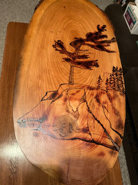 Live edge table with wood burning art