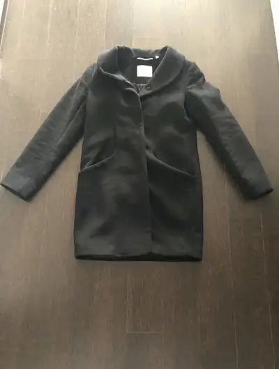 Brand new, never been used, black Aritzia brand wool coat! It is in size small, has two front pocket...