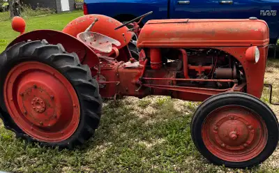 Antique Ford tractor The motor is not running, but not seized. needs back tires. otherwise, in good...