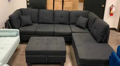 This brand new 7-seater sofa with an ottoman is the perfect addition to any living room, offering am...