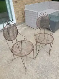 2 vintage parlor  cast iron patio chairs