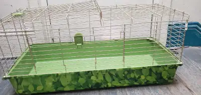This is an All Things Living rabbit cage, perfect for your furry friend! The cage features a durable...