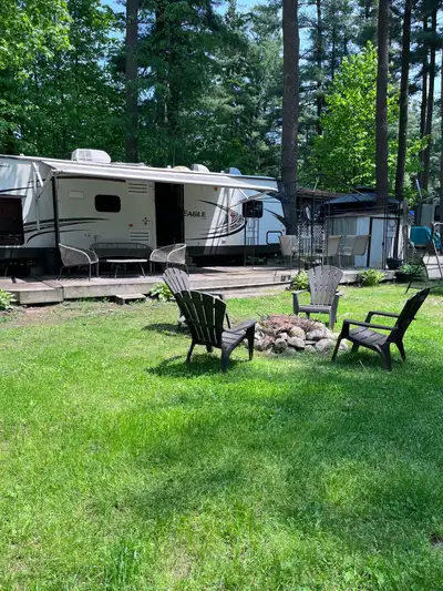 2013 jayco trailer located at bay view lodge in white lake. Trailer has a 3 bed bunk house at the ba...